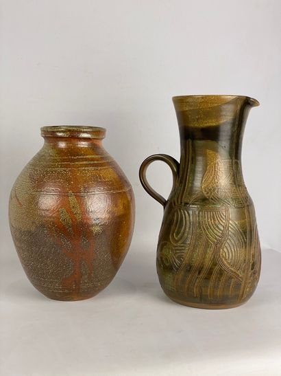  Lot including a vase with ovoid body and hemmed neck, and a stoneware pitcher with...