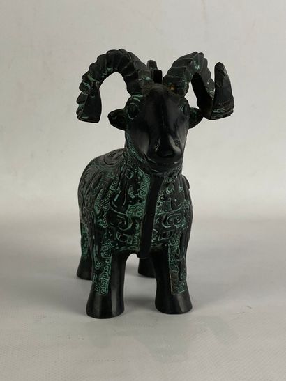  Zoomorphic bronze incense burner with a shaded green patina representing a ram decorated...