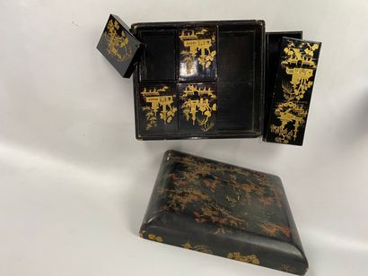  Black lacquered wood box with animated scene on a background of pagodas and landscape,...