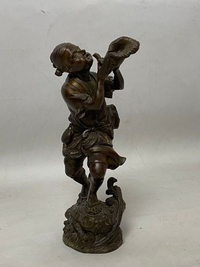 Bronze subject with brown patina showing...