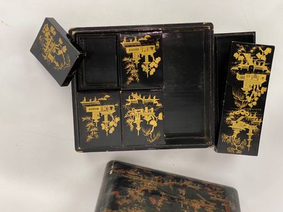  Black lacquered wood box with animated scene on a background of pagodas and landscape,...