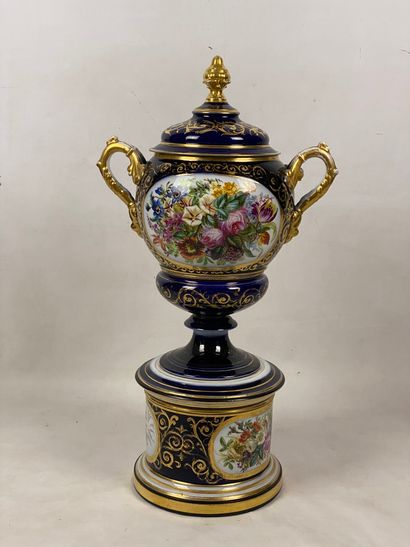 In the taste of SEVRES Large covered vase on a pedestal in midnight blue porcelain...