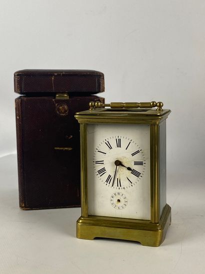Officer's clock in bronze and gilt metal....