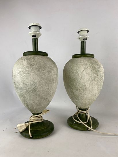 Pair of ovoid lamps on pedestal in composition...