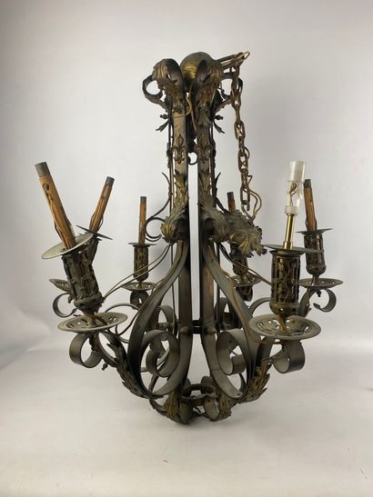 Patinated and gilded metal chandelier with...