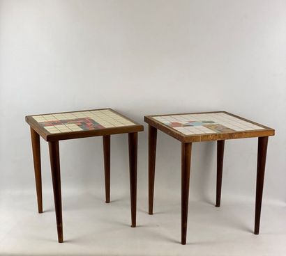 Pair of small wooden tables forming the end...
