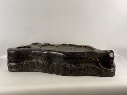  Large blackened wood base, moulded and carved, decorated with foliage Chinese work...