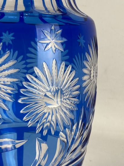  Baluster vase in blue coloured crystal with floral decoration in the Bohemian style...