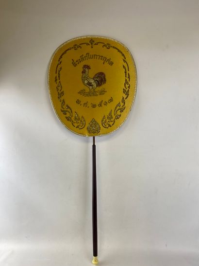  Fan in embroidered fabric on an ochre background decorated with a Southeast Asian...