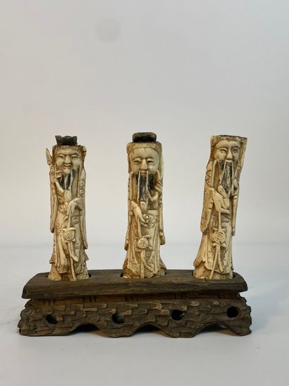  [X] SET OF THREE SMALL BONE SUBJECTS China They are represented standing, each leaning...