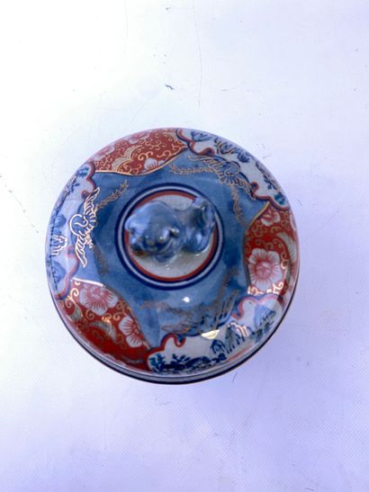  Glazed ceramic covered pot, IMARI Japan, In red and blue tones with rocky landscapes,...