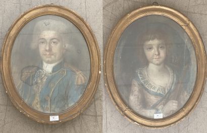 Pair of oval portraits representing a man and a child in costume The child is represented...