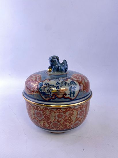  Glazed ceramic covered pot, IMARI Japan, In red and blue tones with rocky landscapes,...
