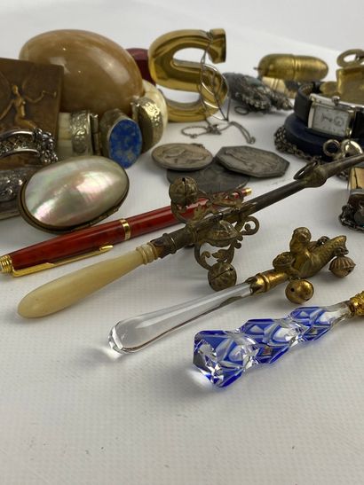 Small lot of display items including: rattles, cachet, English silver blotter (net...