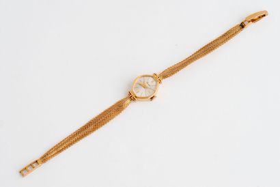  EXACTA 
Montre bracelet de dame en or jaune (750), boîtier oblong, cadran à fond...