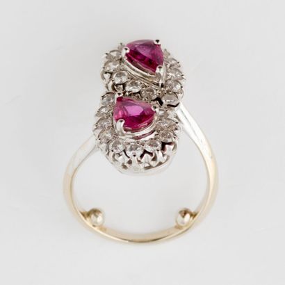  White gold (750) ring Toi et Moi set with two faceted pear-shaped rubies in a claw...
