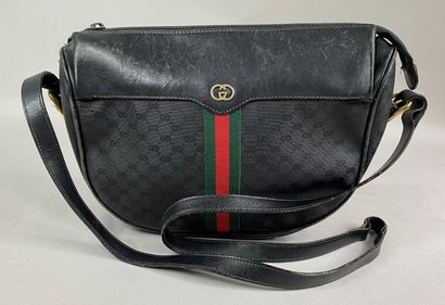  GUCCI 
Shoulder bag in monogrammed coated canvas and black leather, red and green...