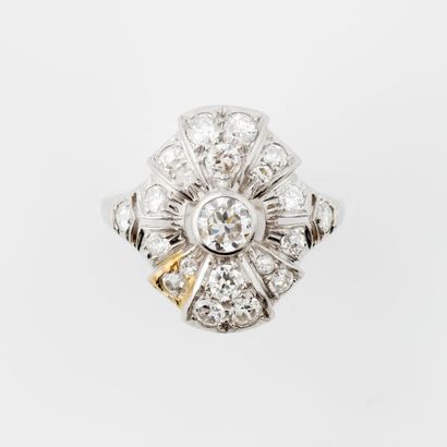  White gold (750) ring, the hexagonal basket centered with a half-cut diamond in...