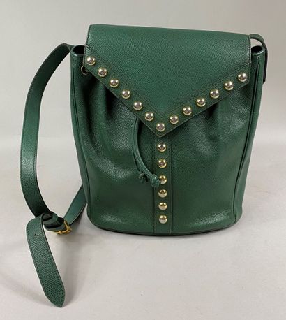 Yves SAINT LAURENT 
Fir green grained leather shoulder bag decorated with studs,...