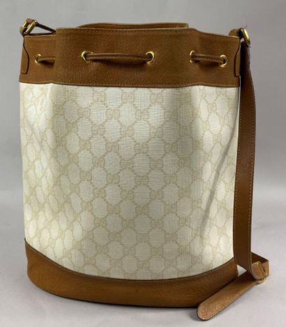 GUCCI 
Bag in beige monogrammed canvas and...