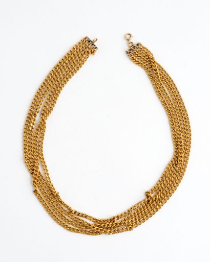  Necklace in yellow gold (750) with four rows of curb chain, spring ring clasp 
Weight...