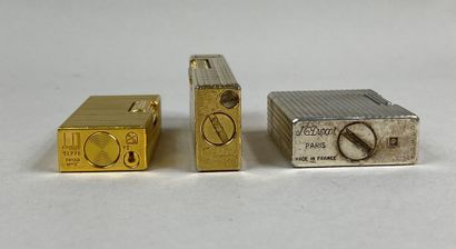  DUPONT, DUNHILL, HUMMINGBIRD 
Set of three silver or gold plated lighters with diamond...