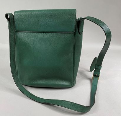  Yves SAINT LAURENT 
Fir green grained leather shoulder bag decorated with studs,...