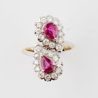  White gold (750) ring Toi et Moi set with two faceted pear-shaped rubies in a claw...