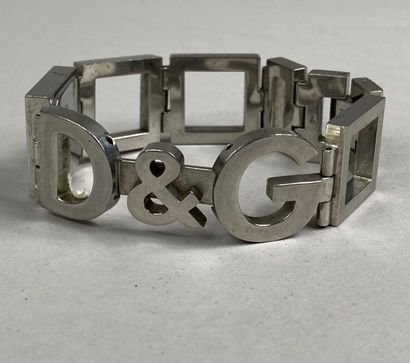  DOLCE & GABBANA 
Montre bracelet de dame en acier, boîtier carré, cadran à fond...