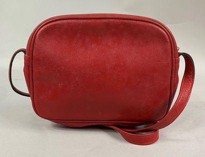  COURREGES 
Small shoulder bag or crossbody in red leather, a patch pocket on the...