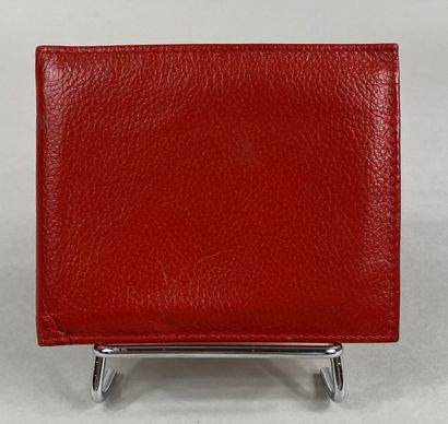  ROLEX 
Portefeuille en cuir rouge 
Numéroté 
9 x 11.5 cm 
(très bon état)