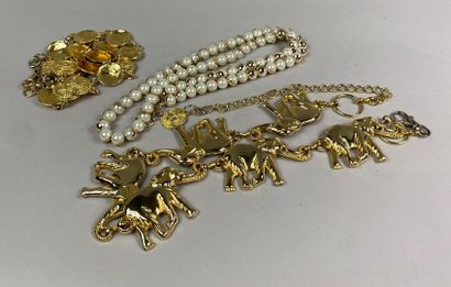  Lot of three fancy belts in gilded metal with articulated links, one with elephant...