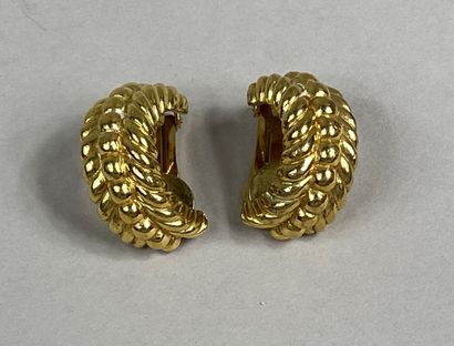  Christian DIOR 
Pair of ear clips in gold-plated metal with a gadrooned motif 
Signed...