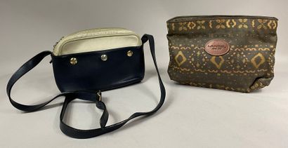  LANCEL 
Lot including a shoulder bag in navy and beige leather and a fabric bag...