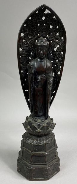 JAPAN 
Bronze subject with brown patina representing...