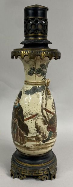  JAPAN, 20th century 
Satsuma earthenware bottle vase decorated with characters and...