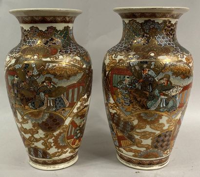  JAPAN, SATSUMA 
Pair of earthenware baluster vases decorated with scholars and children...