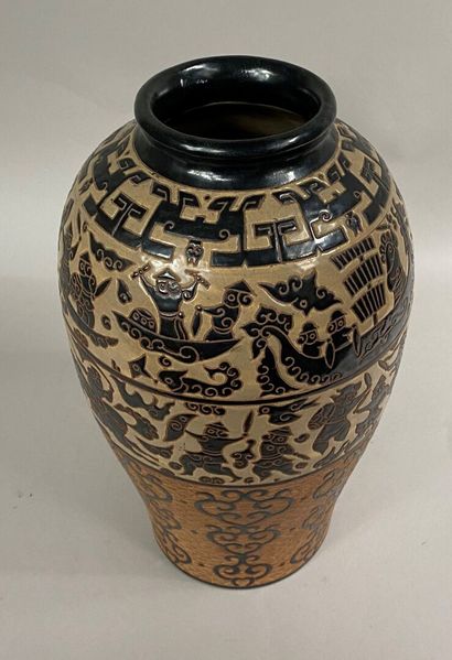  VIETNAM, BIEN HOA 
A baluster vase in glazed terracotta in ochre and black tones...
