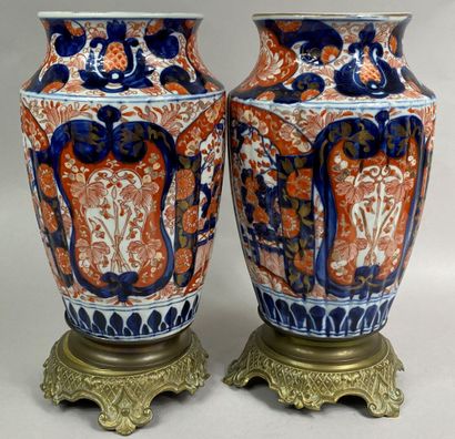  JAPAN, IMARI, 20th century 
Pair of Imari porcelain godronné vases, decorated with...