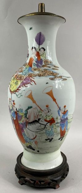  CHINA 
A phoenix-tail shaped porcelain vase with pink enamels showing a procession...