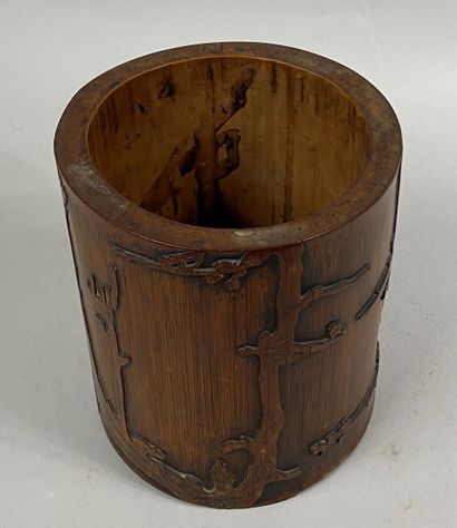  JAPAN 
Brush pot in wood called bitong carved with prunus branches and writings....
