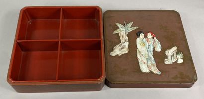  CHINA 
Lacquered wood box with mother-of-pearl inlays decorated in relief with a...