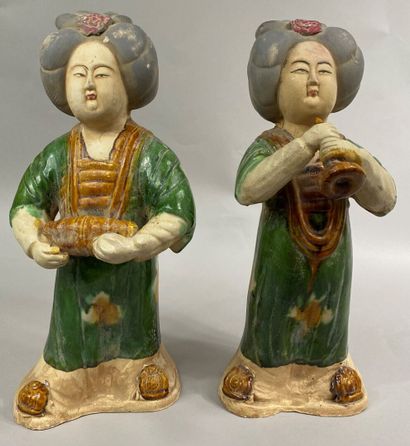  CHINA, 20th century 
Pair of enamelled terracotta subjects called "Sancai" showing...