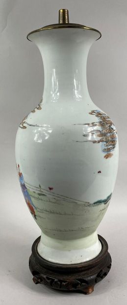  CHINA 
A phoenix-tail shaped porcelain vase with pink enamels showing a procession...