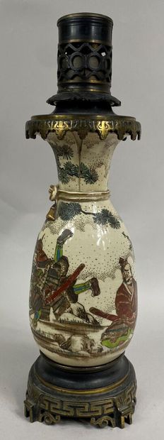 JAPAN, 20th century 
Satsuma earthenware bottle vase decorated with characters and...