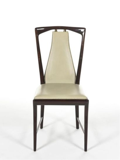 null Osvaldo BORSANI (1911-1985) 
Suite de sept chaises à structure en acajou verni,...