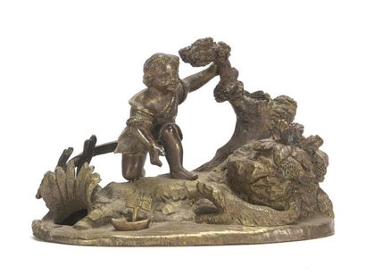 null Encrier en bronze à décor d'un enfant et d'un chien 
Epoque romantique 
H :...