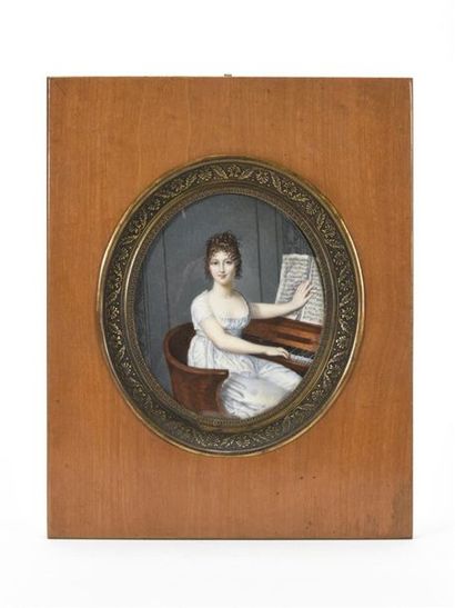 null DUMONT 
Miniature ovale sur ivoire, portait de jeune fille jouant au pianoforte,...