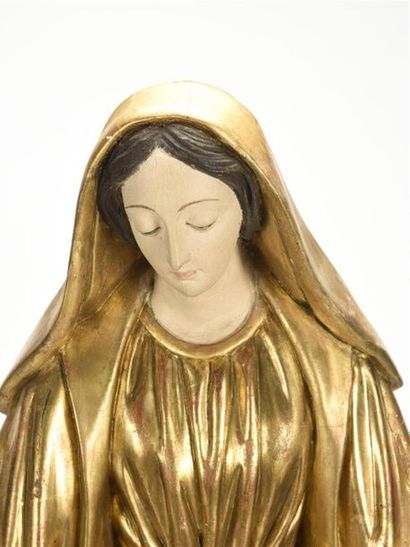 null Vierge en bois laqué doré et sculpté
19ème siècle
H : 84 - L :38 cm