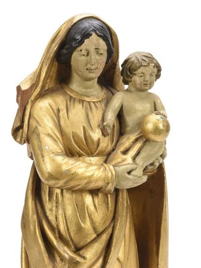 null Vierge à l'Enfant en bois sculpté et doré 
Socle en bois peint
18ème siècle
H:...